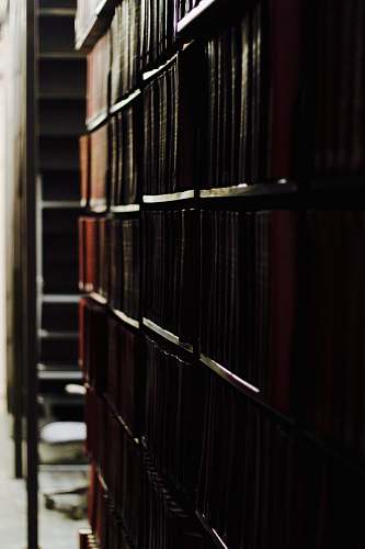 wesleyan university assorted-title book lot in brown wooden bookcases middletown